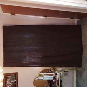 Allen+Roth Woven Brown Black Out Curtain with cream tiebacks.